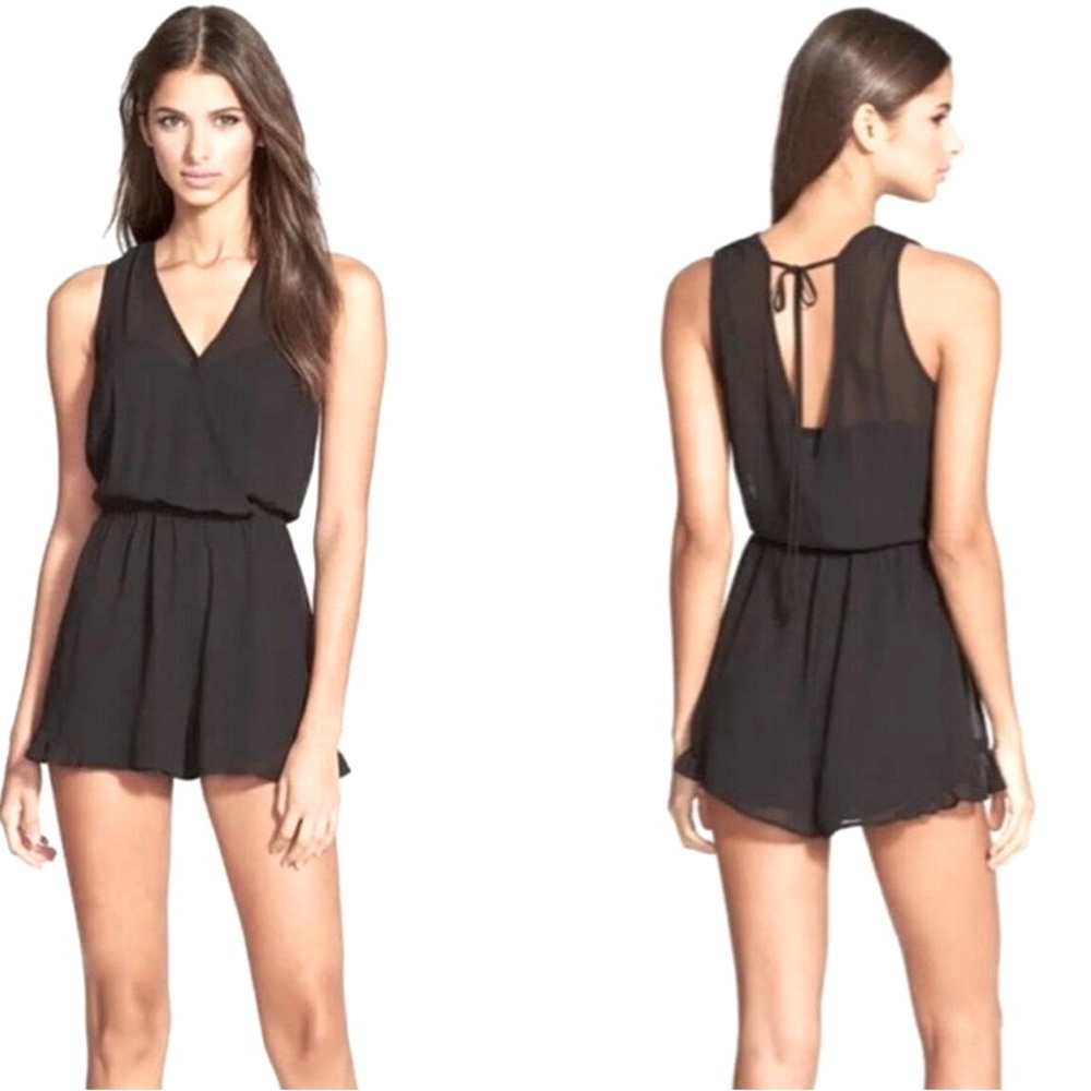 ASTR The Label black v-neck shorts romper, ruffle hem, v-neck back with tie